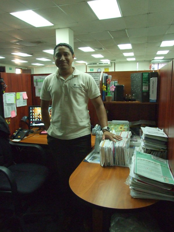 The man in charge of letters from sponsors showing us the letters he will check in and get translated that day