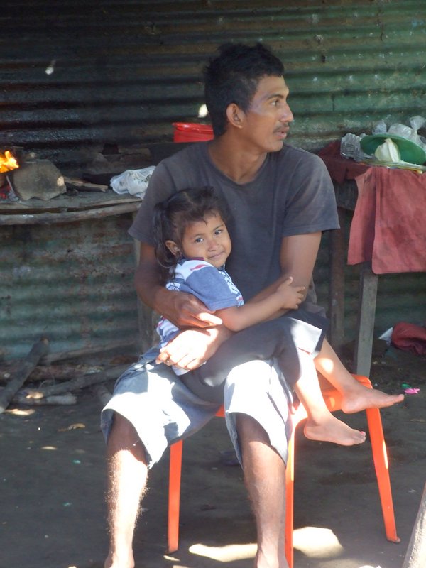Her husband holding the baby - he was such a loving dad!