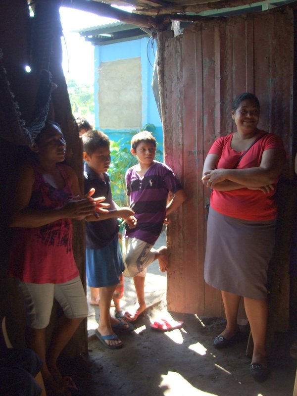 At Alvin and Joel’s house (Alvin in the purple) with his mom and Joel’s teacher and the other boys who work with him