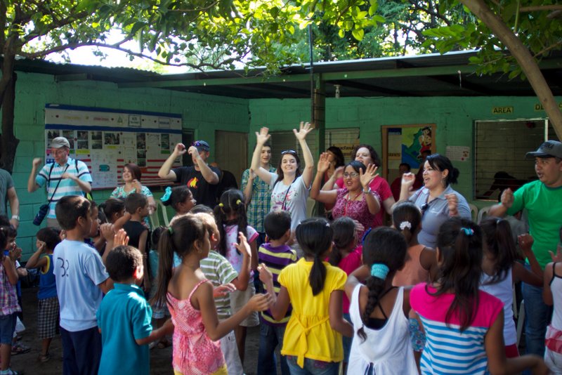 Singing with the kids at the school
