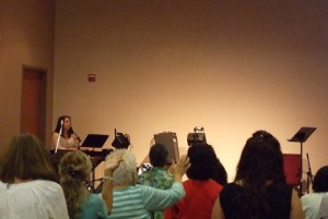 Leading a worship song before speaking at Grove City