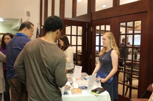 My daughter doing a great job at the table while I talk to people about Compassion at St. Luke’s