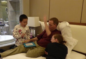 Out of focus, but high five from dad for a game of tic tac toe won!