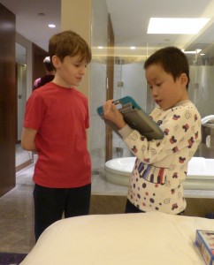 New ge ge (big brother) and di di (little brother) drawing silly pictures on the magna doodle