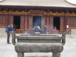 The incense burning outside one of the idol’s halls.
