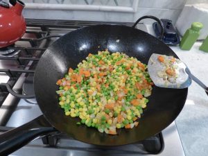 With the peas and corn