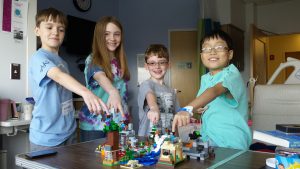 Picture from July 18th - Hannah and Micah and friends with Toby and Noah and came to build with them.  They visited every couple of days - so kind!